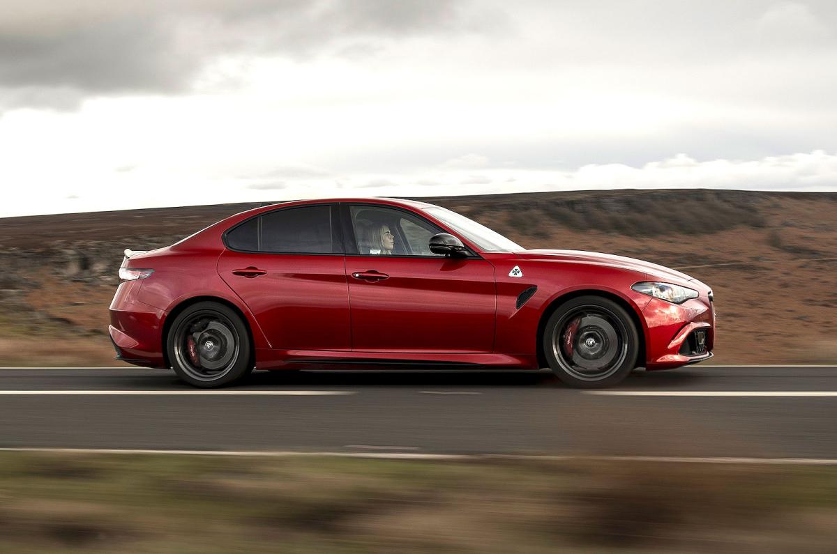 Red Alfa Romeo Giulia Quadrifoglio right driving