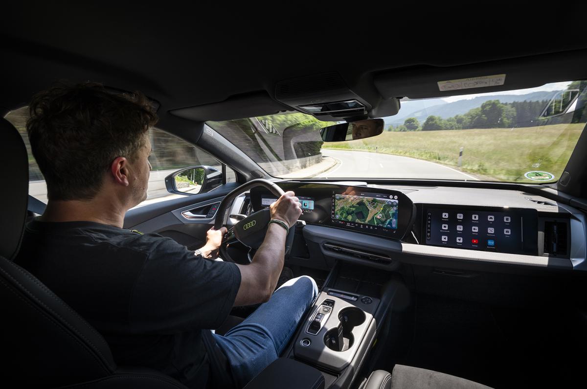 John Howell driving the Audi Q4 e-tron Sportback