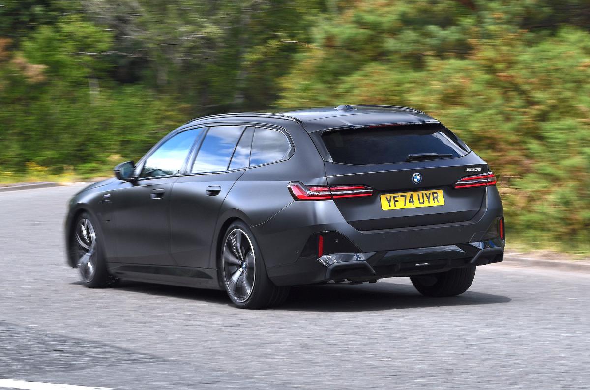 BMW 5 Series Touring rear left driving