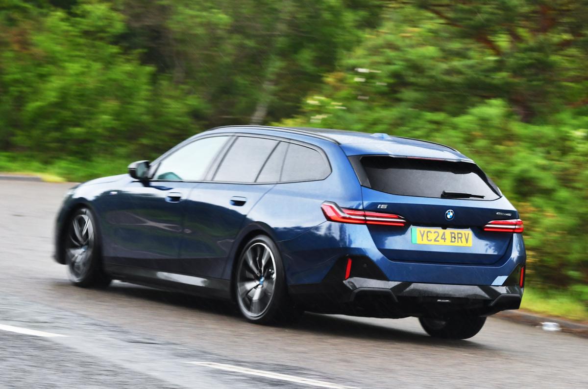 BMW i5 Touring rear driving