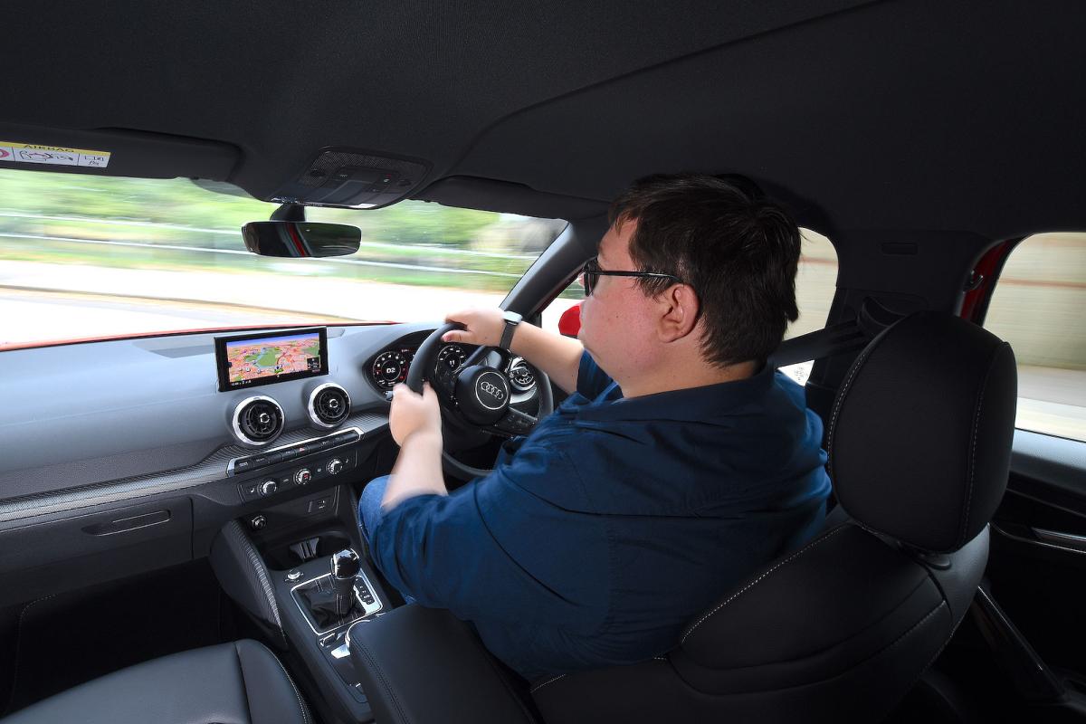 Darren Moss test driving Audi Q2