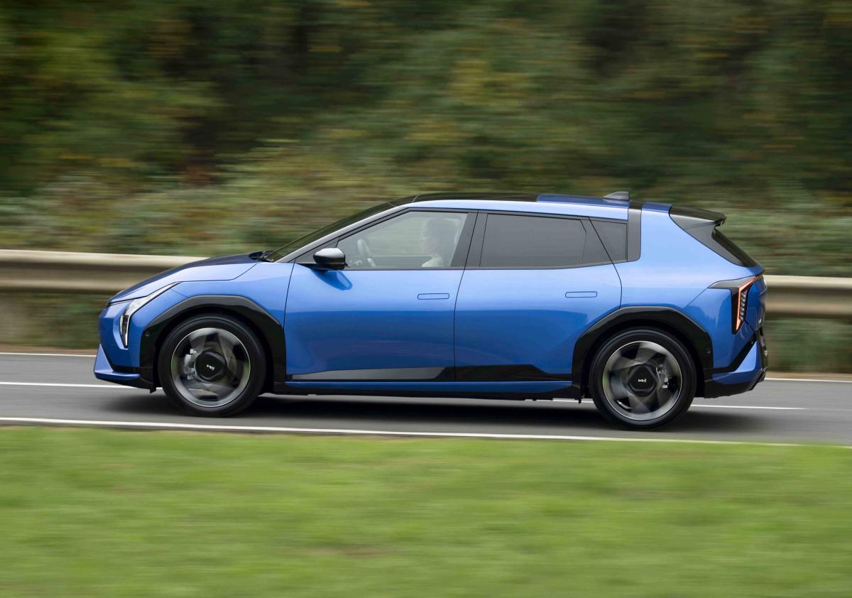 Kia EV4 hatchback side profile dynamic