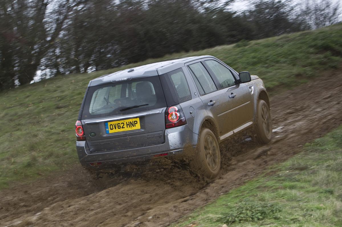 Land Rover Freelander rear up muddy hill