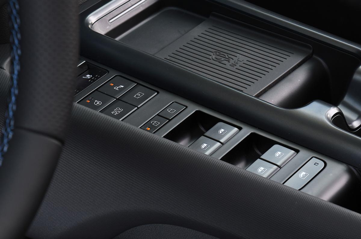 Hyundai Ioniq 6 N window controls and charging pad