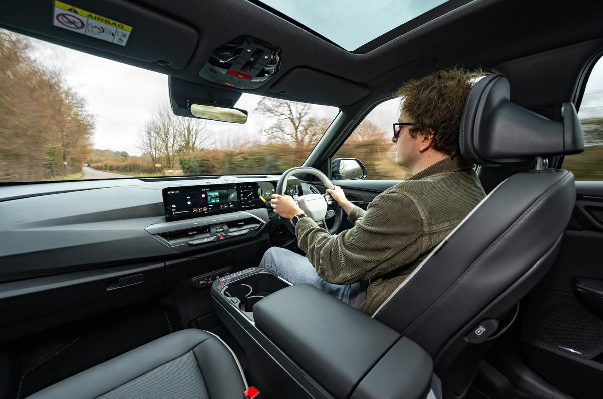 Oliver Young driving the Kia EV5