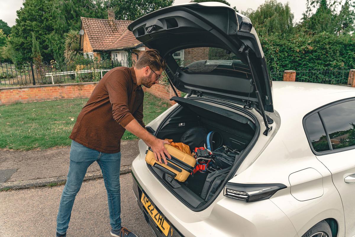 Kiall Garrett loading Peugeot 308 boot