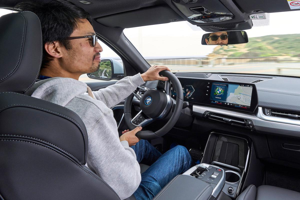 Lawrence Cheung test driving BMW iX2