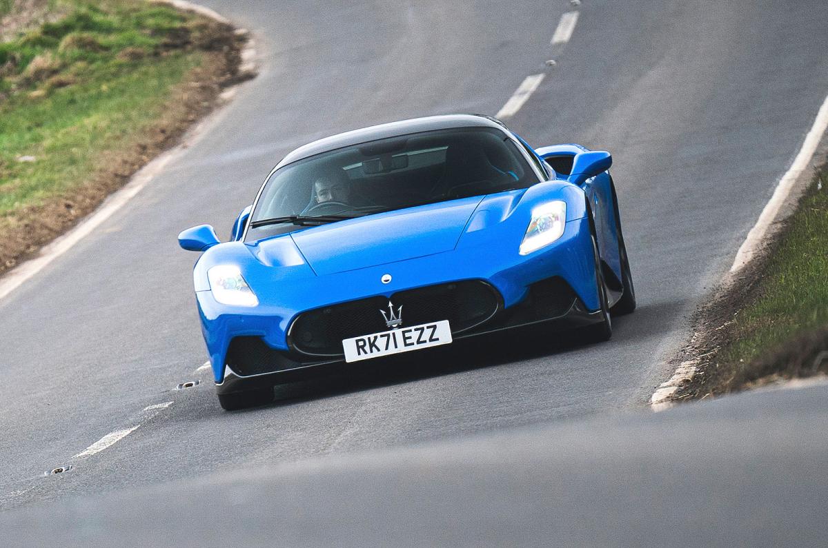 Blue Maserati MC20 front driving