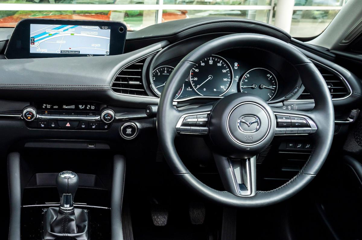 Mazda 3 Saloon steering wheel and screens