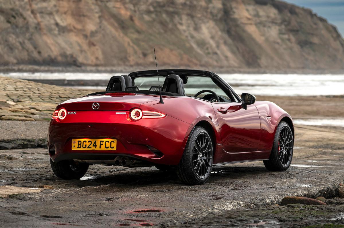 Red Mazda MX-5 Roadster rear right static