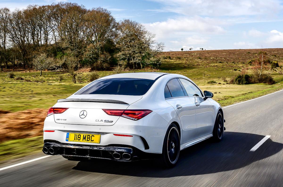 White Mercedes-AMG CLA 45 S rear right driving