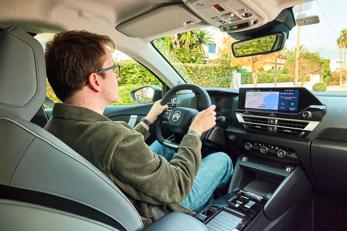 Oliver Young test driving Citroen C4