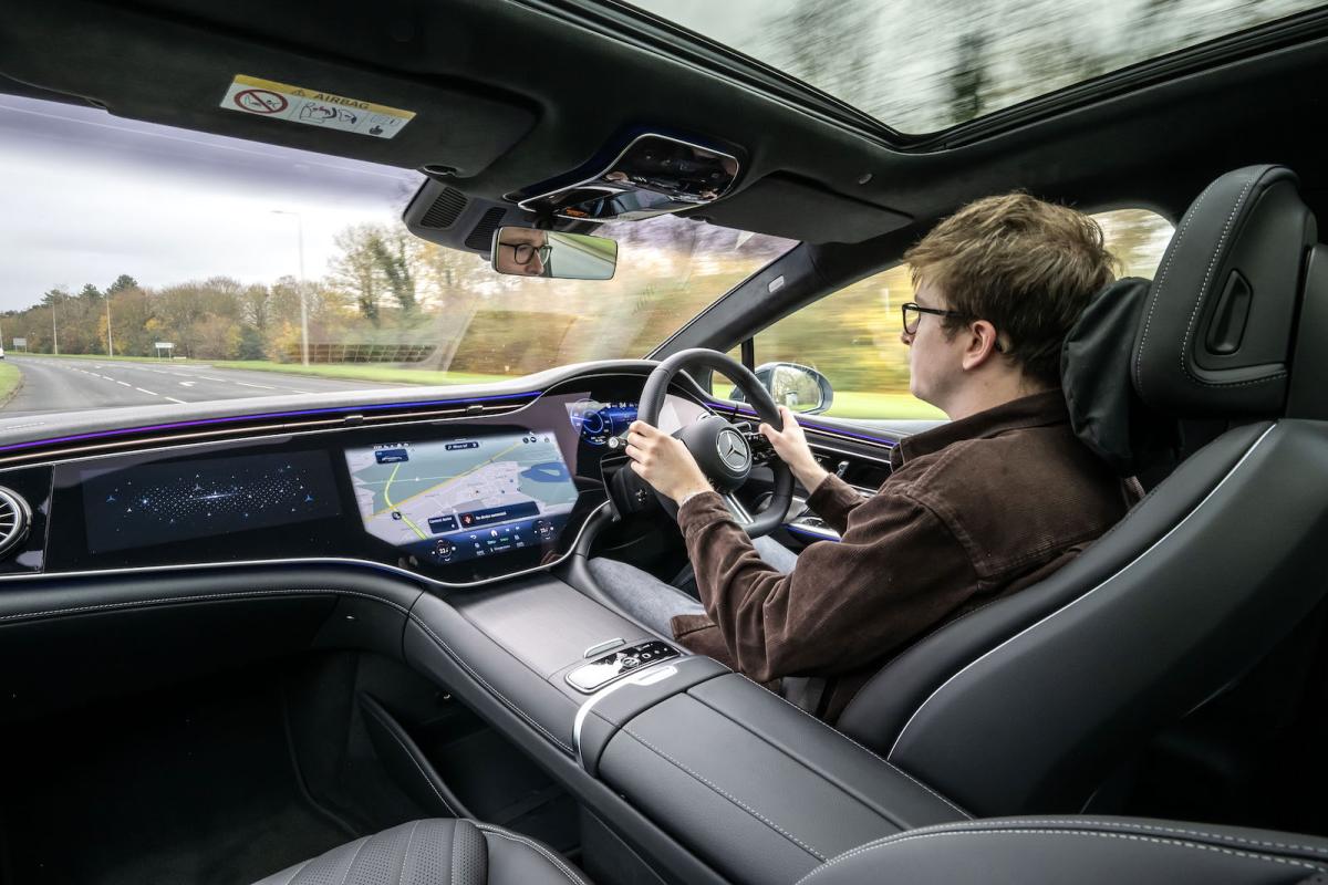 Oliver Young test driving Mercedes EQE
