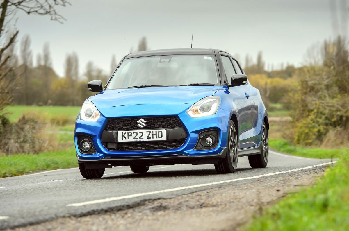 Blue Suzuki Swift Sport front driving