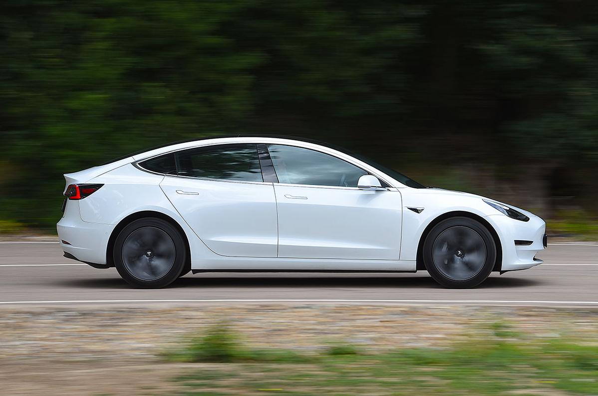 Used Tesla Model 3 2019-present side driving