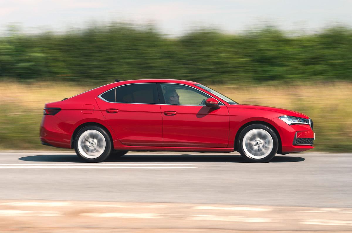 Used Skoda Superb 2024-present panning shot red