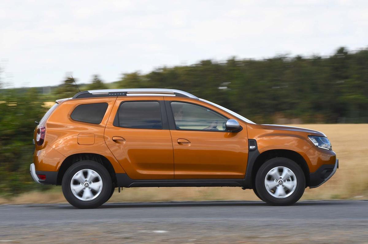 Used Dacia Duster 2018-2024 side driving orange