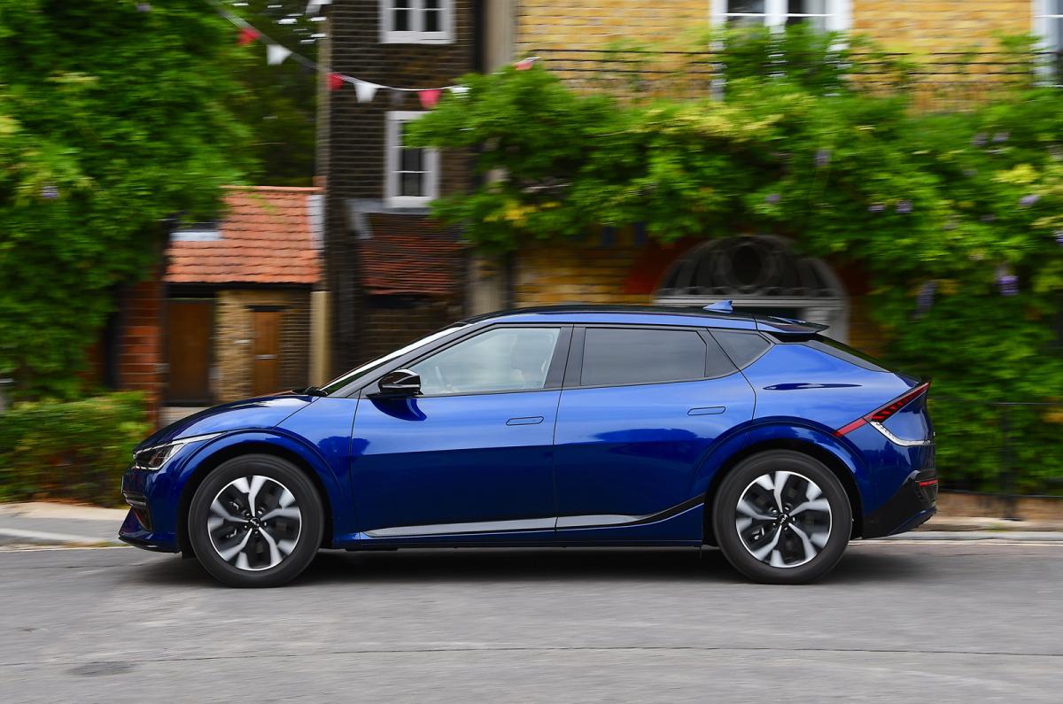 Used Kia EV6 2021-present side driving blue