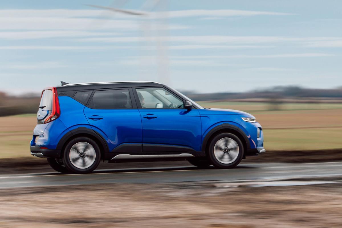 Used Kia Soul EV 2020-2025 side driving blue