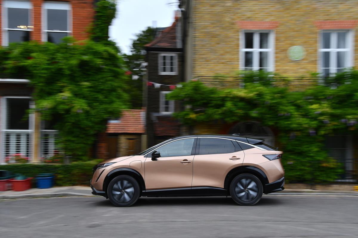 Used Nissan Ariya 2022-present side driving copper