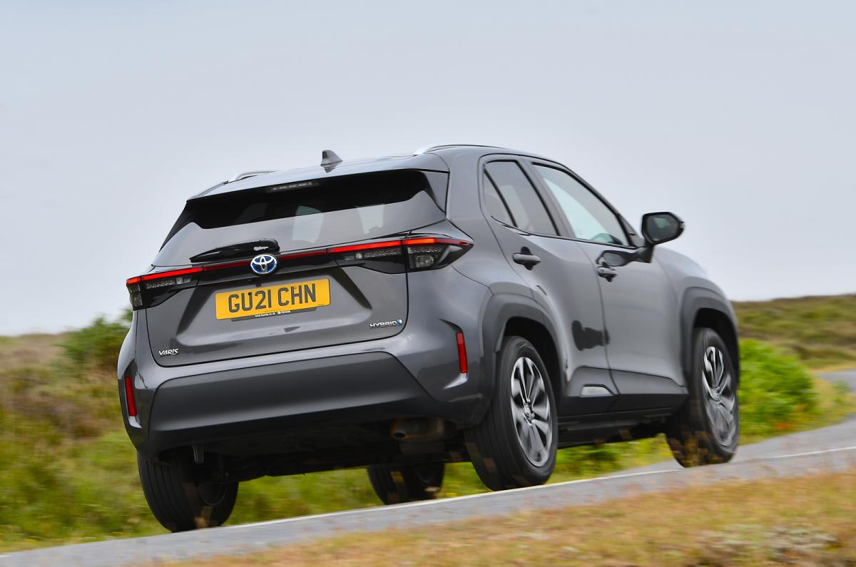 Used Toyota Yaris Cross 2021-present rear driving grey