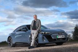 Audi E-tron GT LT with person standing in front of it