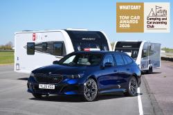 BMW 5 Series Touring front static with caravans and gold winner logo.jpg
