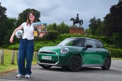 Mini Cooper SE LT with Beatles album