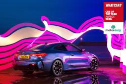 bmw_4_series_coupe_coty_awards_hero_pic_with_logo