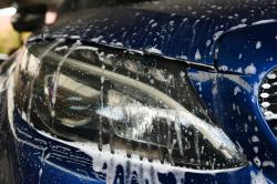 Cleaning blue Mercedes C-Class headlight detail