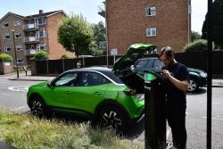 Charging an electric car on the street