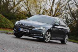 Skoda Superb Estate 2019 wide left cornering RHD