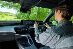 George Hill test driving Peugeot E-3008