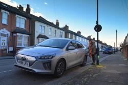 Plugging Hyundai Ioniq Electric into lamp post charger