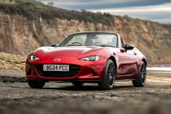 Red Mazda MX-5 Roadster front left static