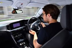 Neil Winn test driving electric Vauxhall Mokka