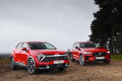 New Kia Sportage vs used Volvo XC60 fronts