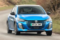 Blue Peugeot e-208 front cornering
