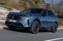 Peugeot e-3008 review, blue, driving front 2024