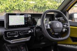 A wide shot of the Renault dash area with Google Maps on the infotainment screen.