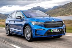 Blue Skoda Enyaq front right driving
