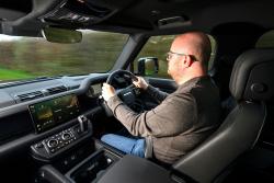 Stuart Milne test driving Land Rover Defender