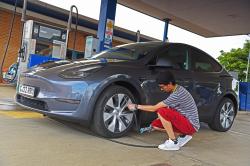 Checking the tyre pressures of a Tesla Model Y