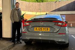 Tom filling up the Honda Civic at a petrol station