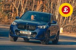 BMW X1 front cornering with Target Price logo