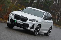 White BMW iX3 front cornering